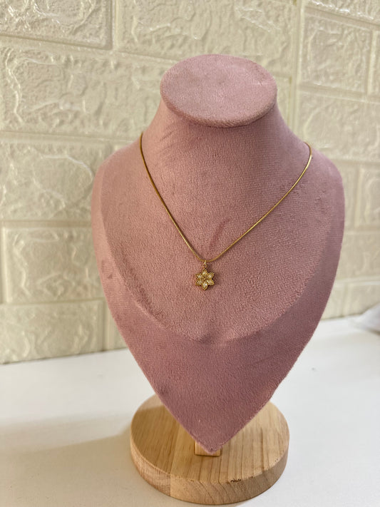 Gold flower pendant