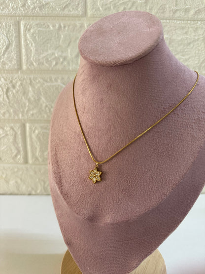 Gold flower pendant